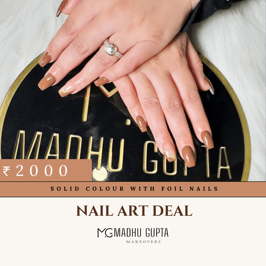 Caramel brown nails with gold foil accents at MG Makeovers, Gurgaon