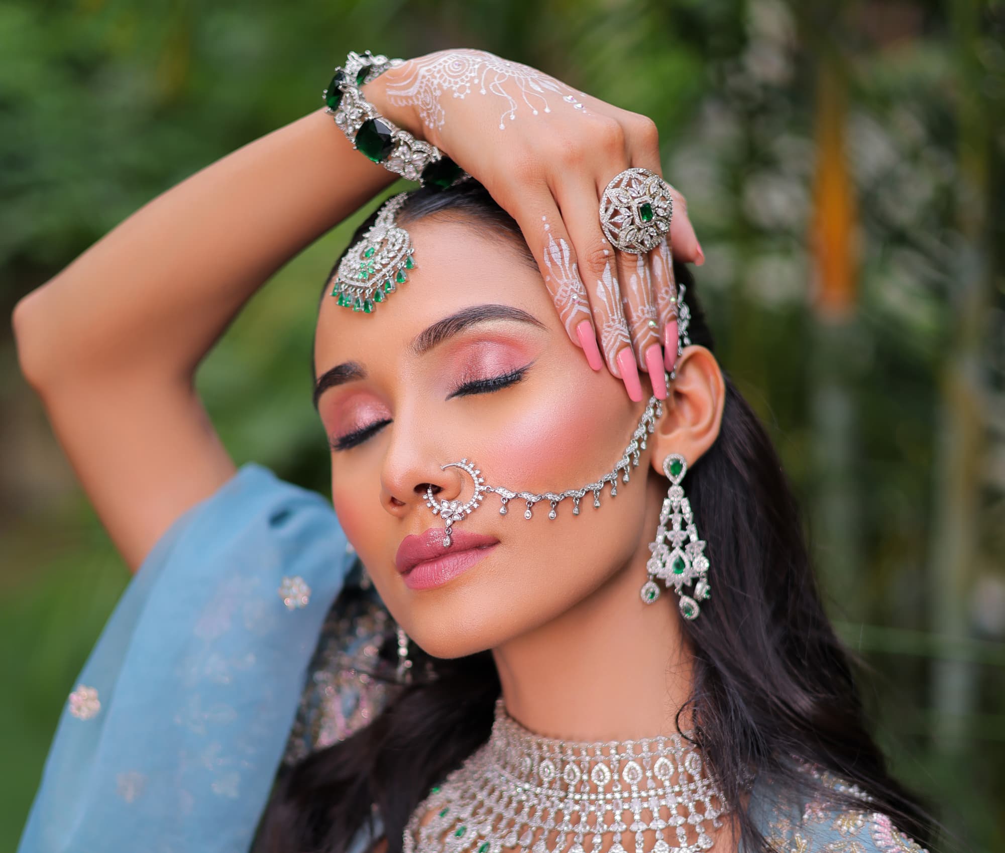 Pastel sundowner bride in soft glam makeup and intricate lehenga, styled by MG Makeovers