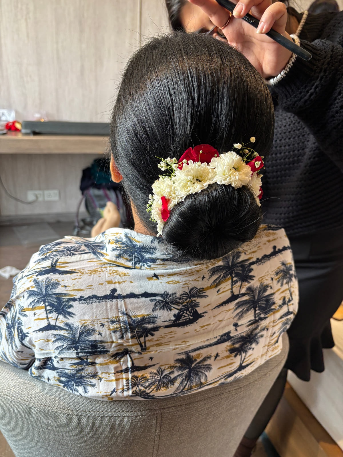 Hair Bun with Bounce and Flowers. Bridal and party hairstyling by Madhu Gupta at MG Makeovers, Gurugram