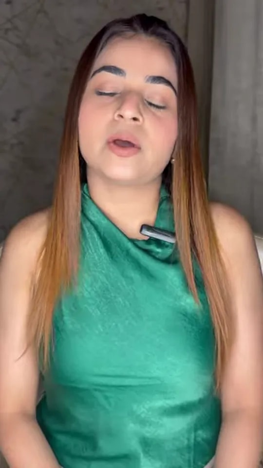 Video thumbnail: presenter in a green satin top explaining the top 5 beauty treatments for a bride-to-be