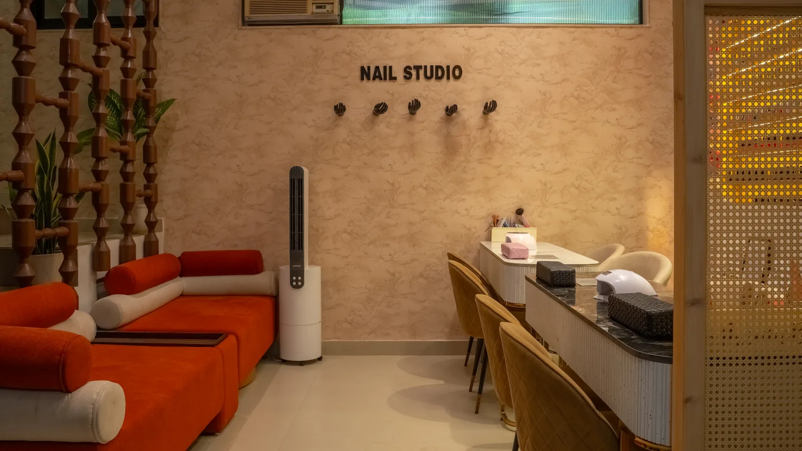 Nail studio seating and manicure stations at MG Makeovers