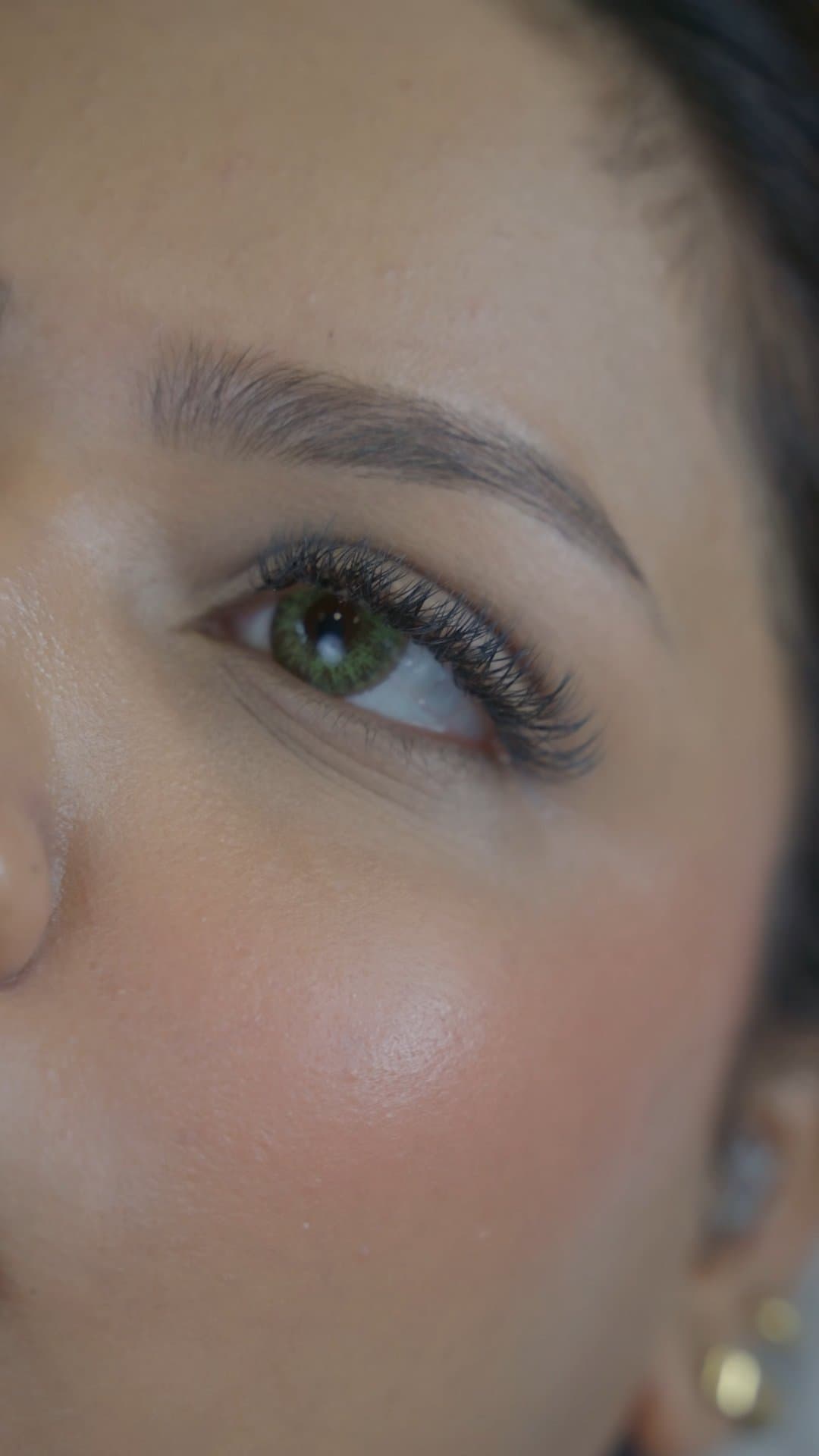 Close-up of finished UV eyelash extensions on a client at MG Makeovers Gurugram