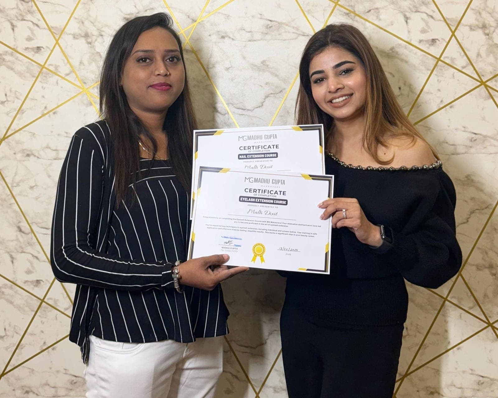 Student receiving an MG Makeovers Academy certificate