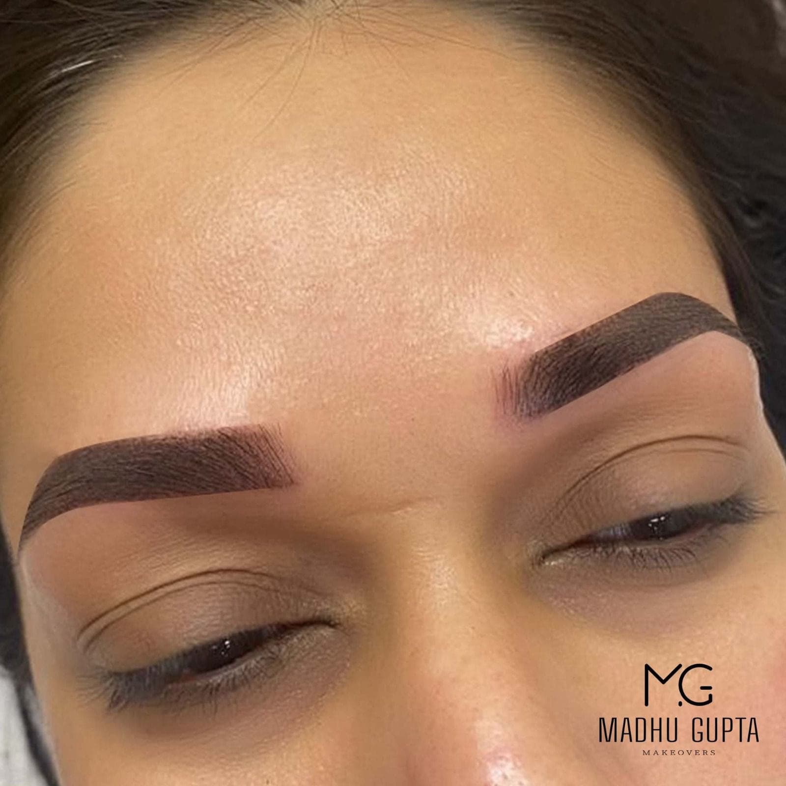 Side view of defined PMU brows at MG Makeovers