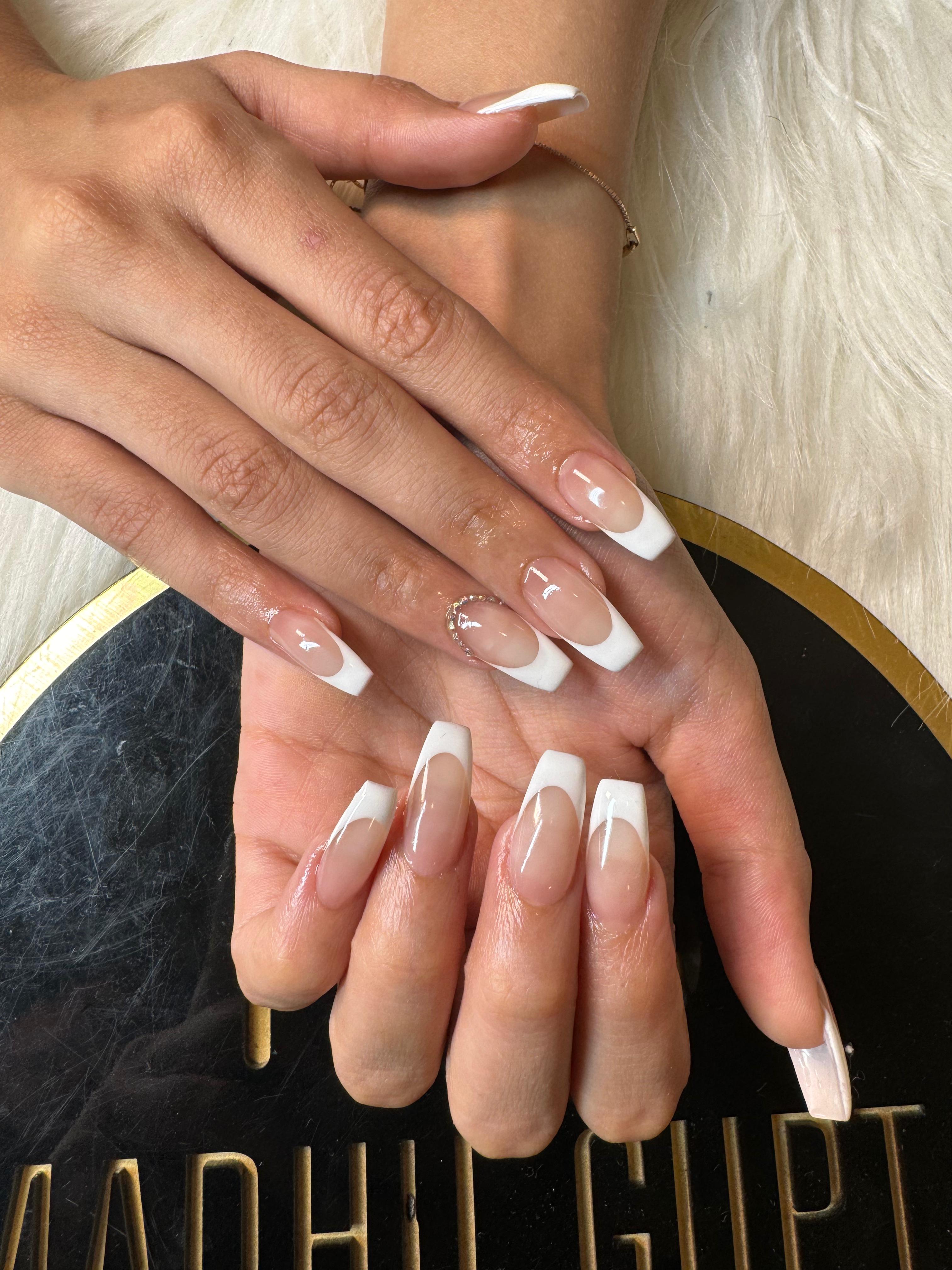 Classic French tip coffin nails at MG Makeovers, Gurugram