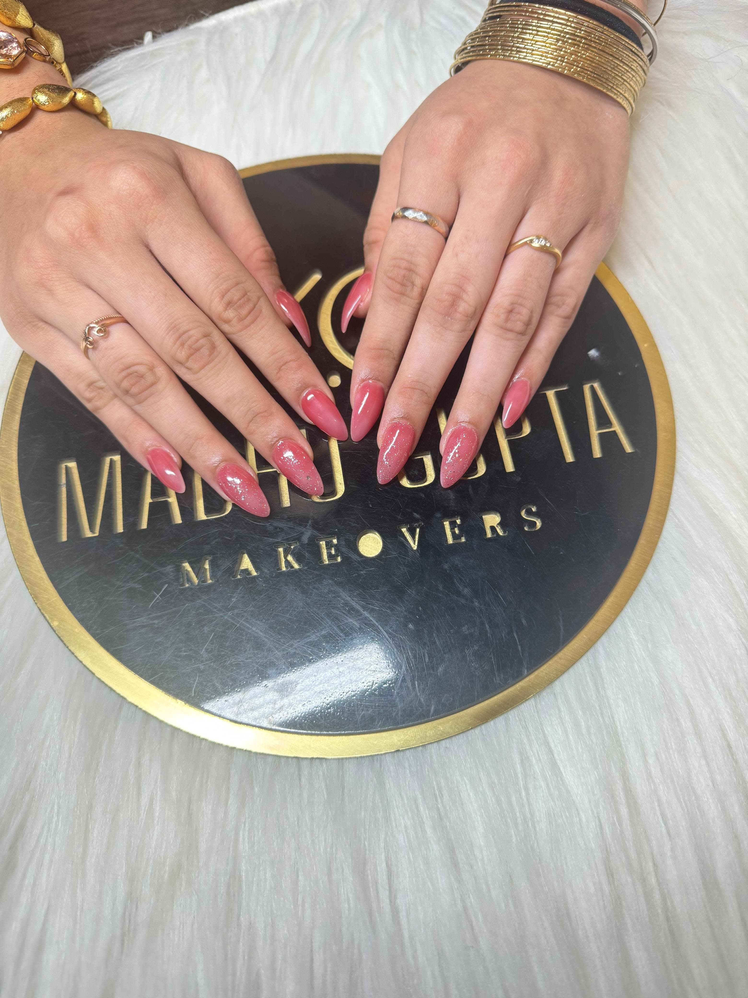 Coral Pink Glitter Almond Nails