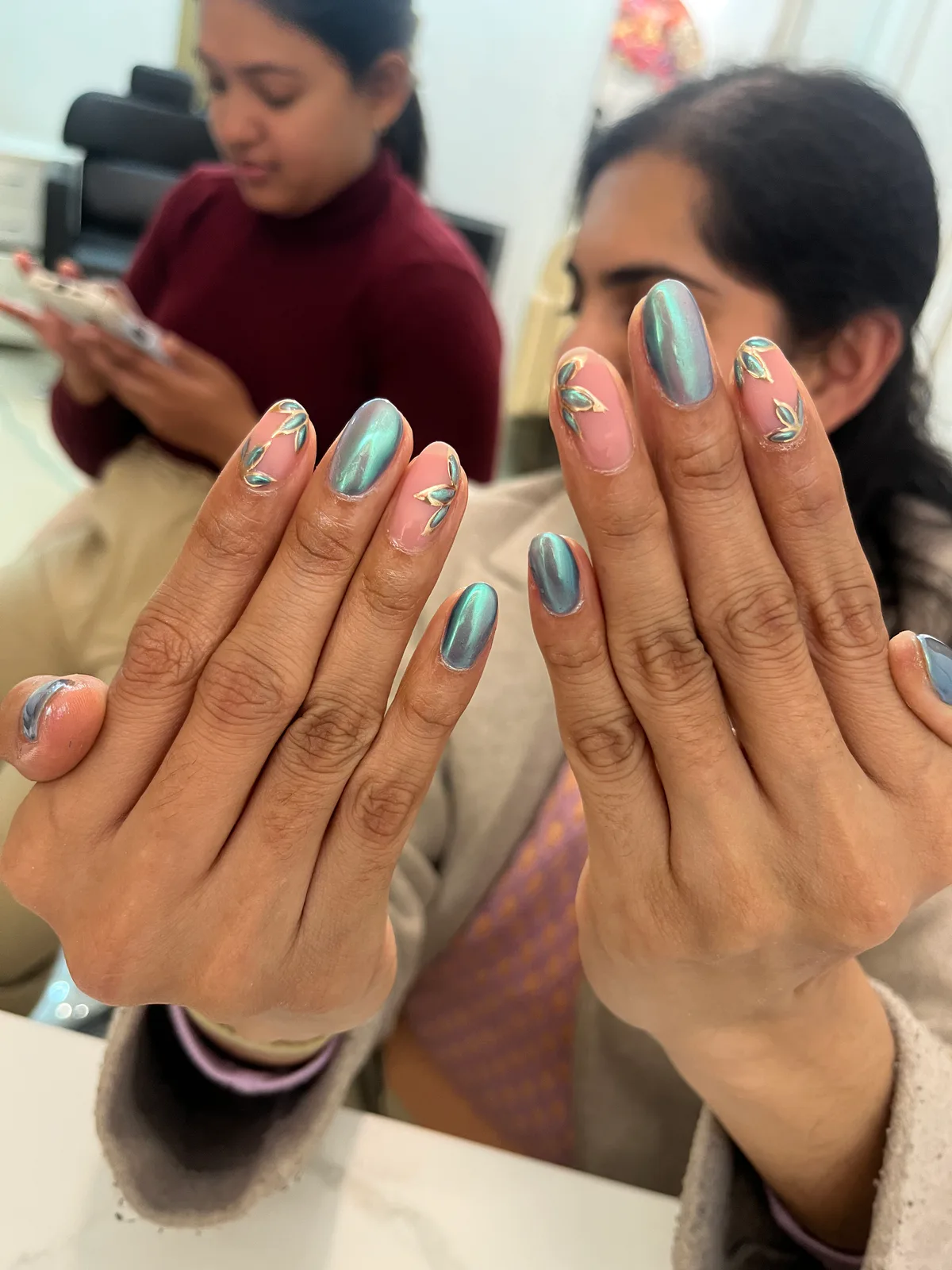 Blue Chrome Floral Nails Blue Chrome Floral Nails nail art created at MG Makeovers, Gurugram