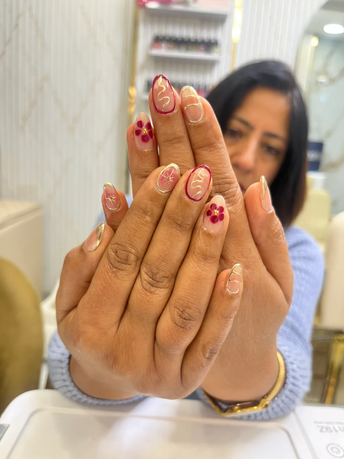 Peach Red Floral Nails Peach Red Floral Nails nail art created at MG Makeovers, Gurugram