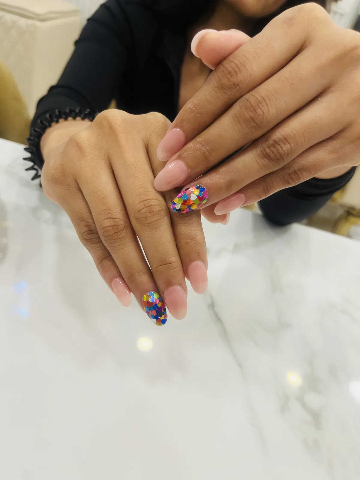 Pink nail extensions with colourful confetti accent nail art by MG Makeovers