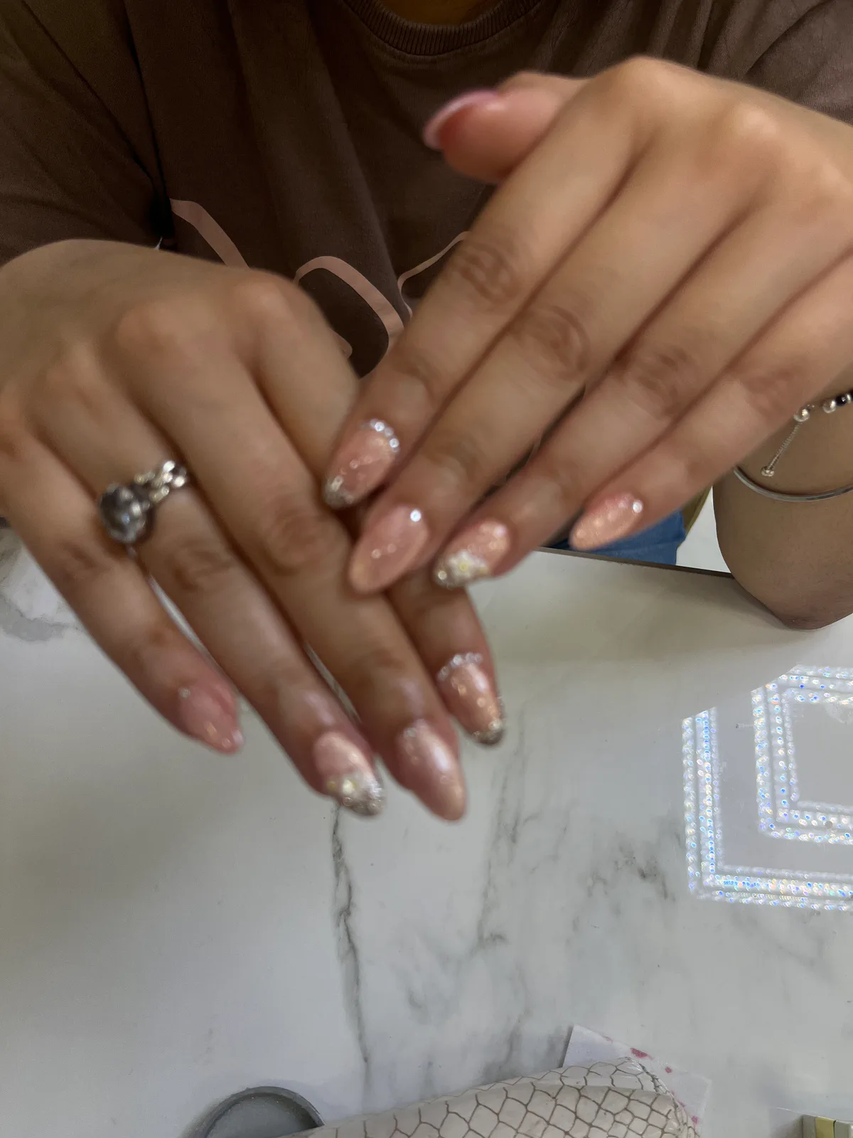 Rose Gold Glitter Nude Almond Nails Rose Gold Glitter Nude Almond Nails nail art created at MG Makeovers, Gurugram