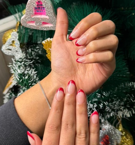 Acrylic Nail Extensions with a Red French Base for Christmas Nail Design at ₹1800