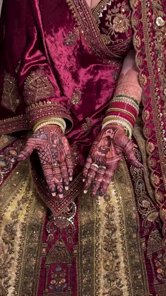 Wine Lehenga Bride with Mehendi