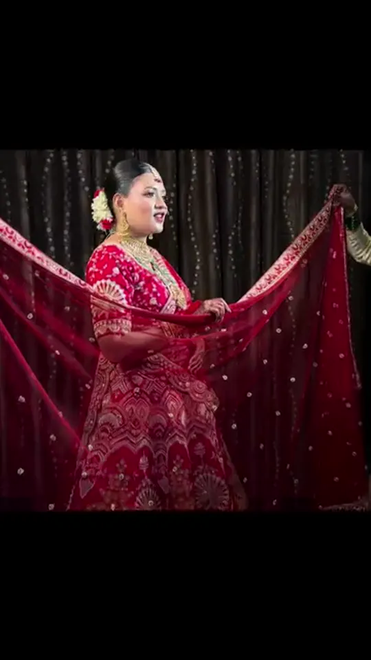 Red Bridal Lehenga, Evening Portrait — real bride with makeup by Madhu Gupta at MG Makeovers